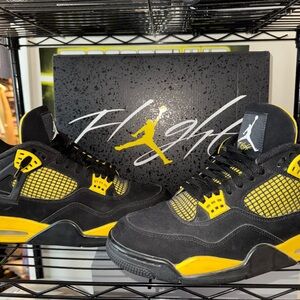 Air Jordan 4 Retro black and yellow